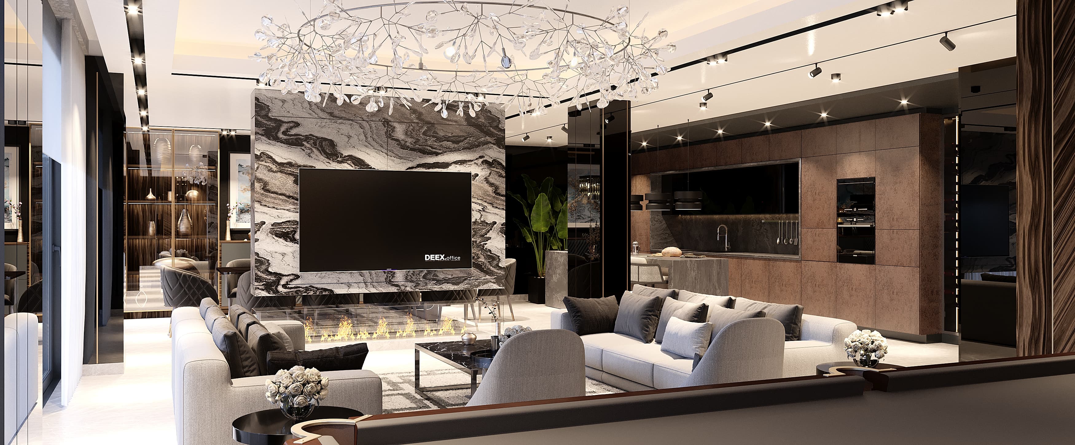 Open-plan living with marble TV wall, crystal chandelier and fireplace