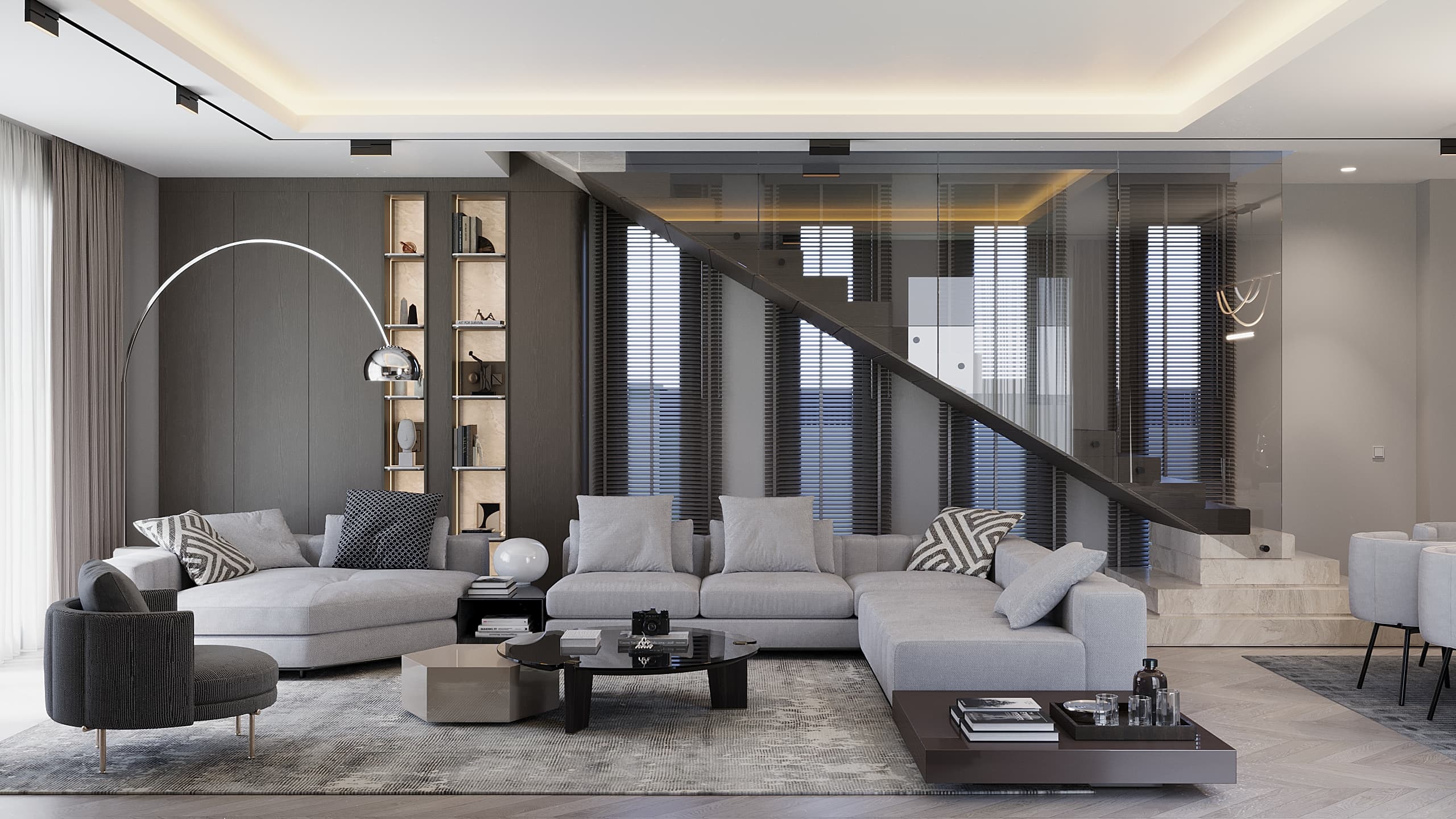 Living room with staircase and glass balustrade railing