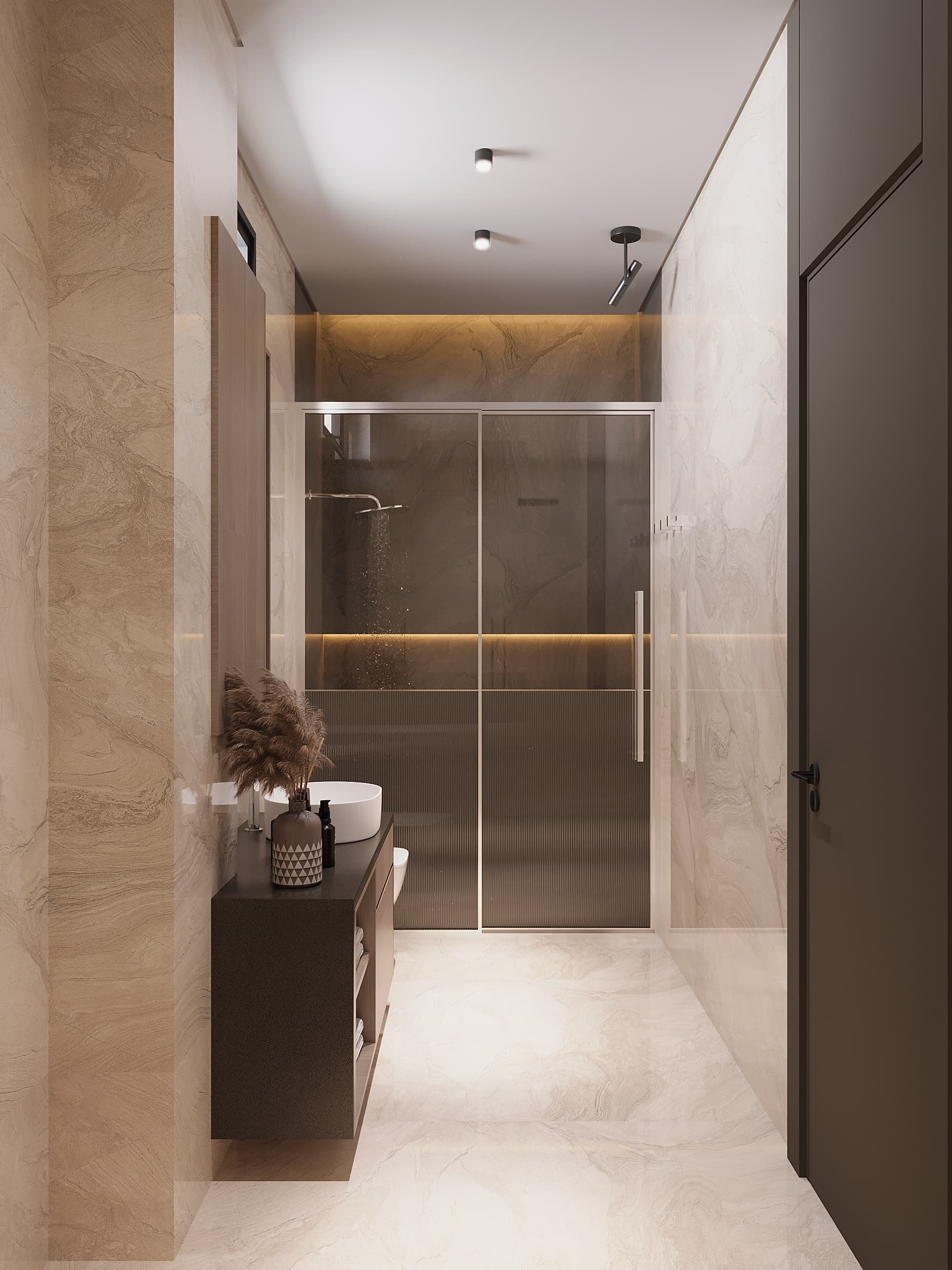 Warm-toned bathroom with marble, glass shower and pampas grass