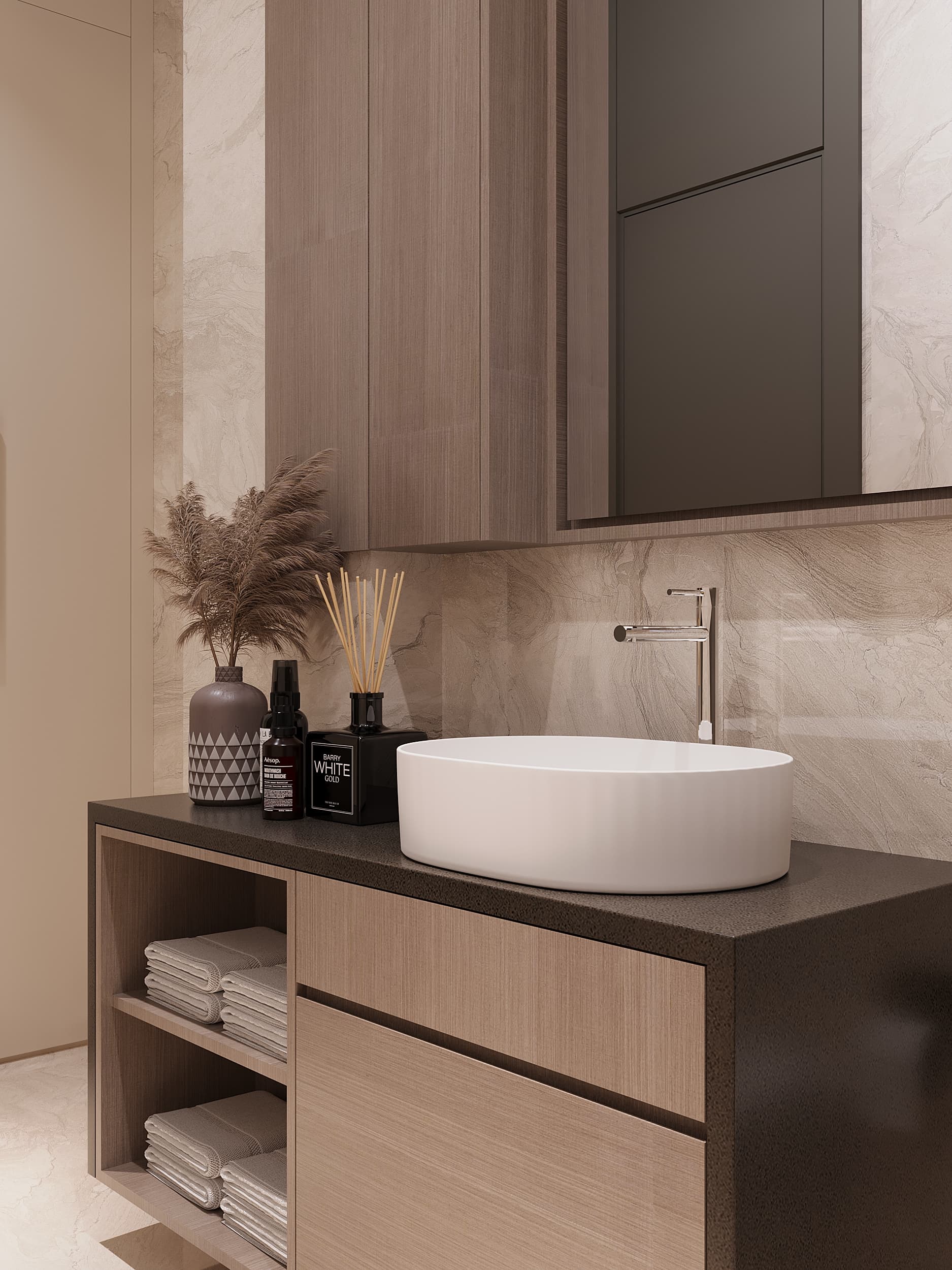 Vanity close-up with ceramic vessel sink and reed diffuser