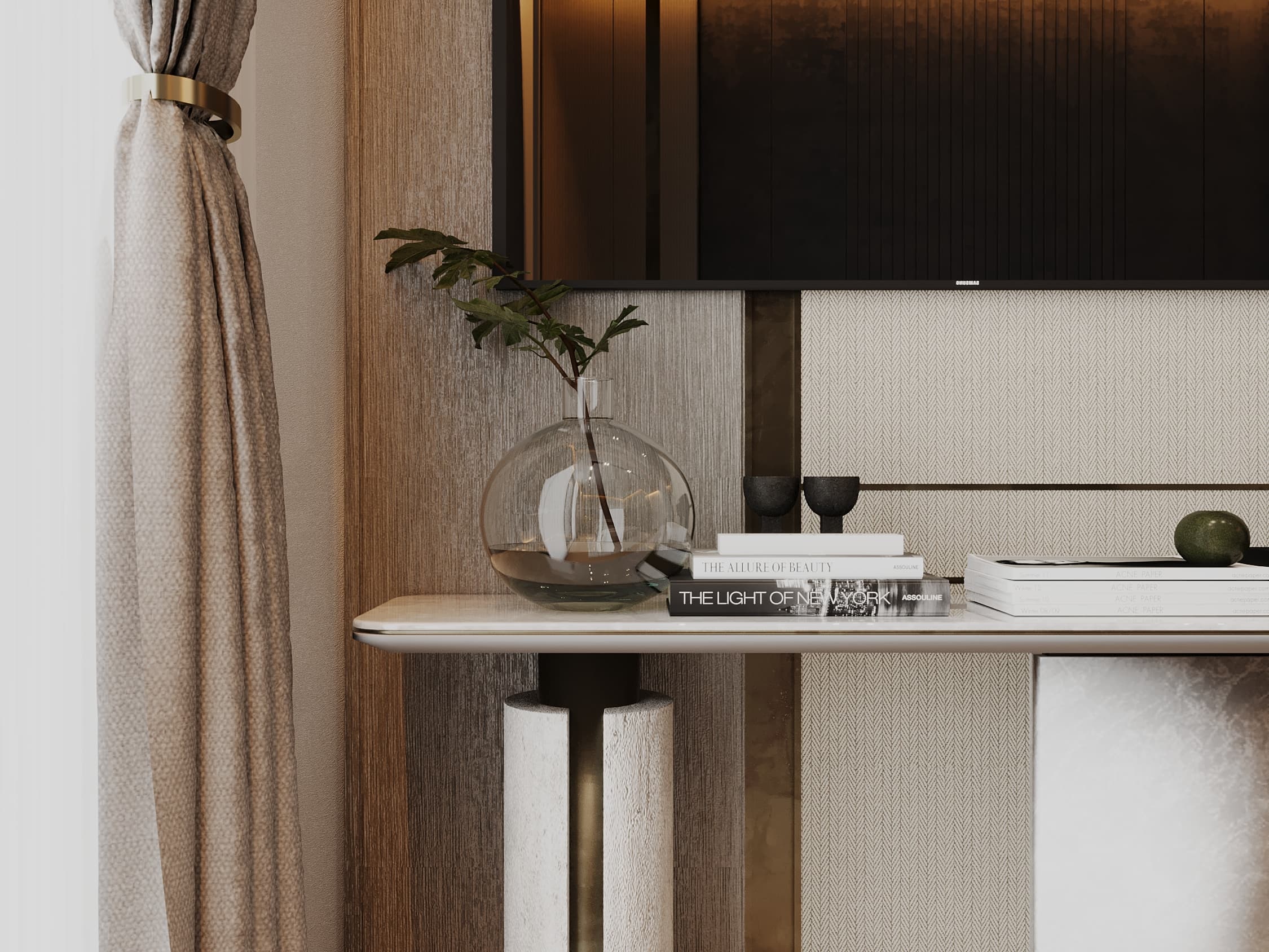 Vanity desk vignette with glass vase, stacked books, and brass accents