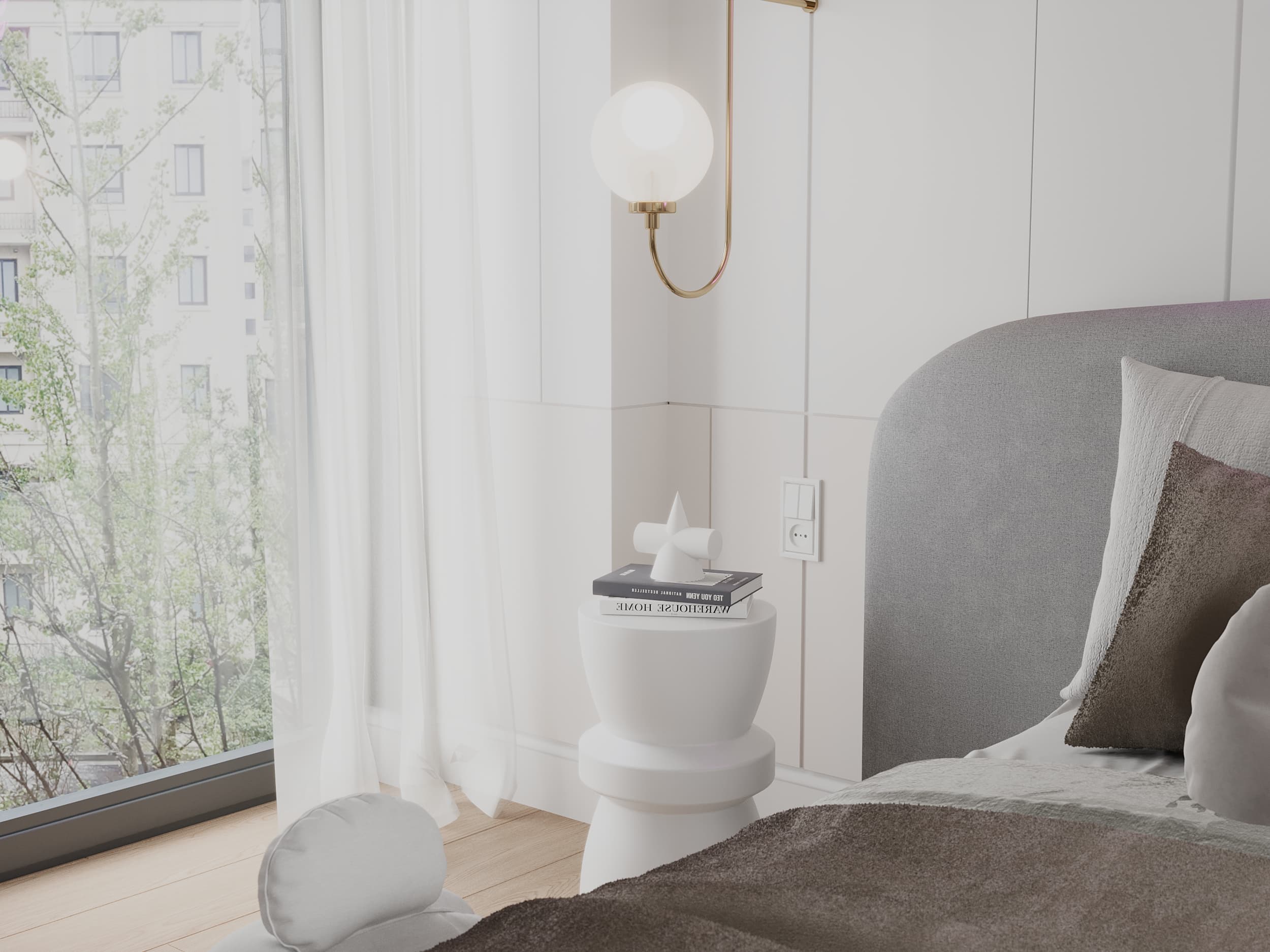 Bedside detail with brass globe wall sconce and white nightstand