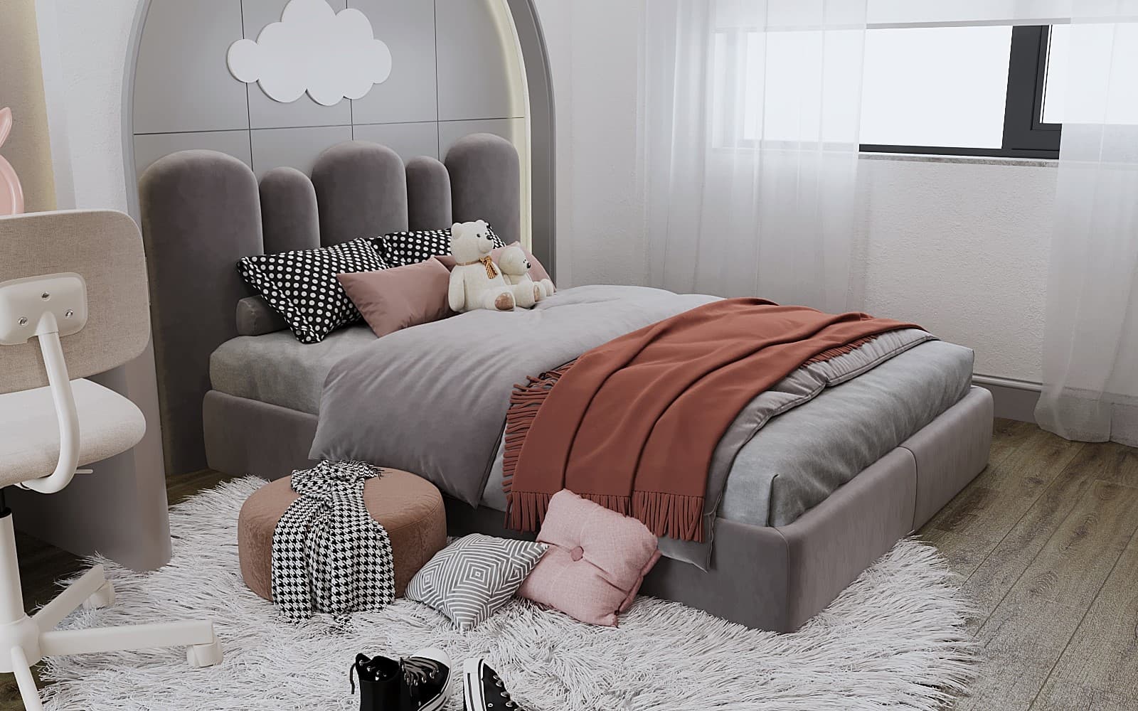 Close-up of girl's bed with teddy bears, polka dot pillows, and fluffy rug