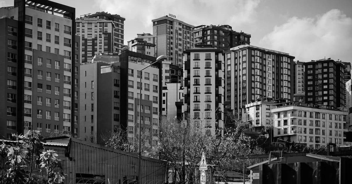 Modern architecture landmark in Istanbul with glass facade against the historic city skyline