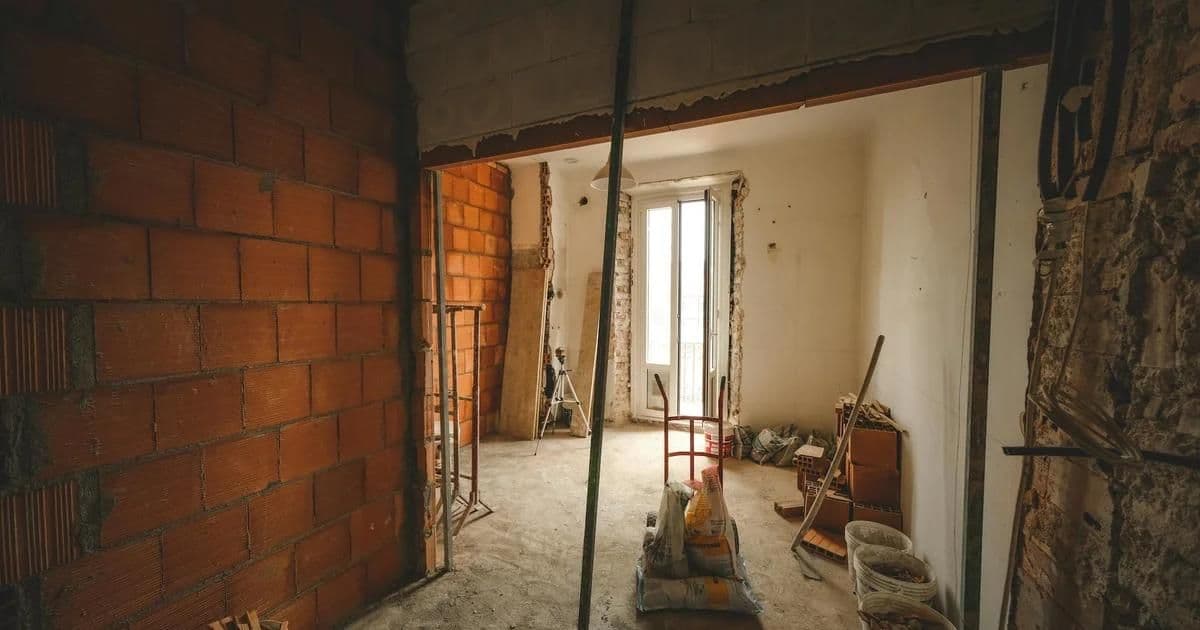 Side-by-side comparison of a renovated building and a new construction on the same site