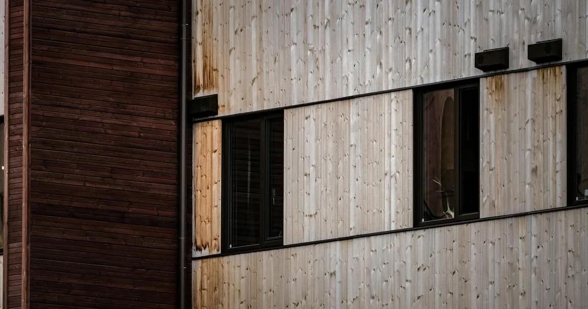 Modern home exterior with composite wood cladding alternative showing natural timber appearance